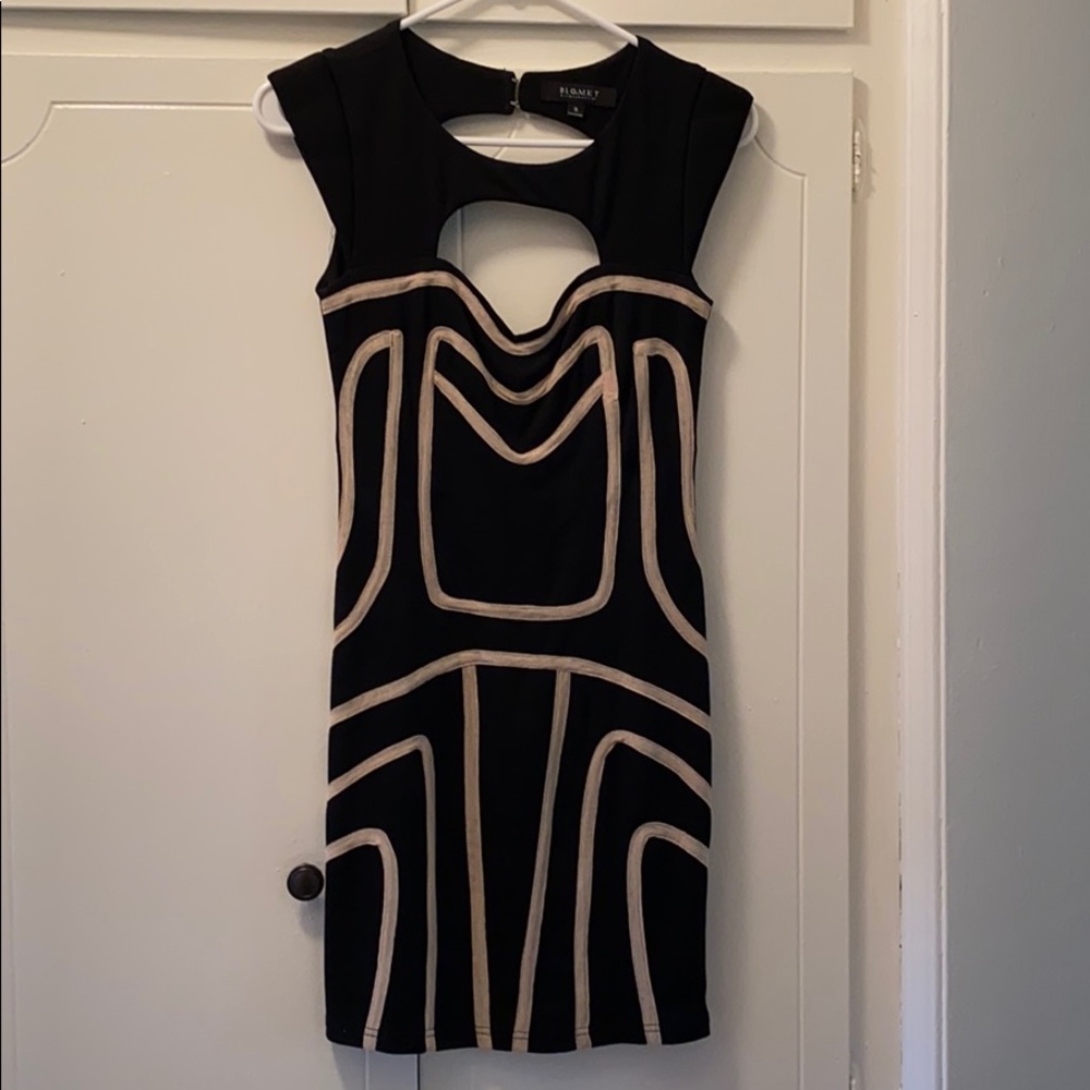 Black cocktail dress with white trim